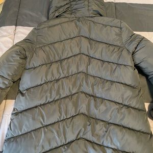 Long women’s puffer jacket - black